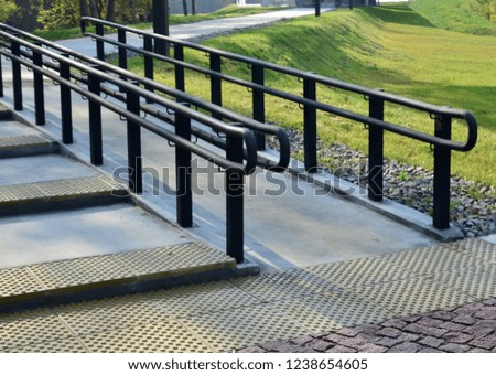 Urban railings, handrails for pedestrians, stairs and paving slabs