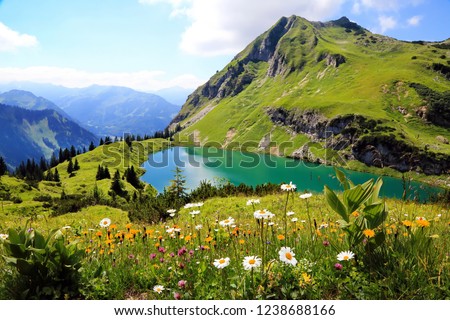 Seealpsee a high mountain lake in the Bavarian Alps Royalty-Free Stock Photo #1238688166