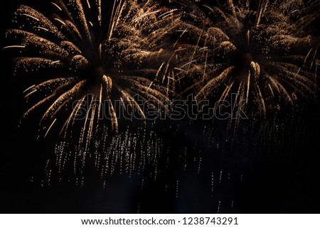 Fabulous multi-colored fireworks display on dark background, long exposure