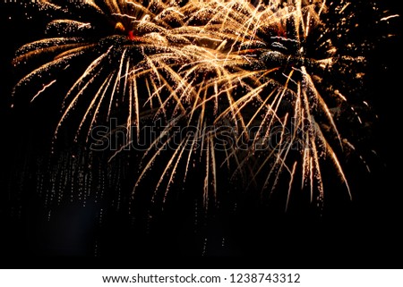 Fabulous multi-colored fireworks display on dark background, long exposure