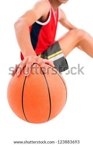 Isolated image of a guy holding a basket ball