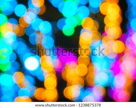 colorful light bokeh at night time with copy space. soft focus background