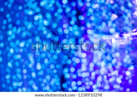 blurred color abstract background with bokeh defocused lights.