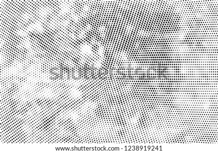 Abstract halftone black and white. A monochrome background of a chaotic pattern. Fantastic texture for printing on business cards, posters, labels
