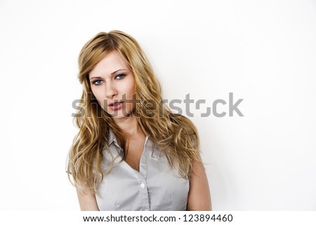 Closeup of blond woman on white background