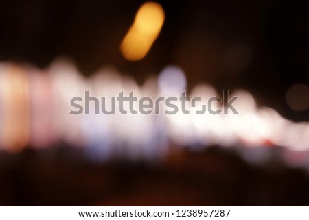 Colorful trafic and city lights in blur at night, motion blur