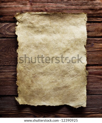old paper on brown wood texture with natural patterns