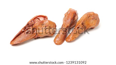 Braised duck heads, Chinese cuisine on white background 
