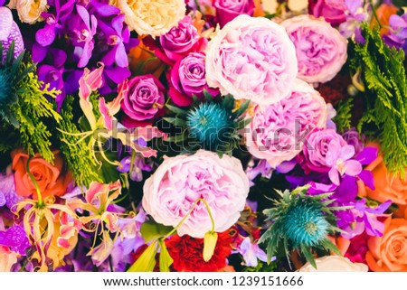 vintage roses in different shades of color full in event party.