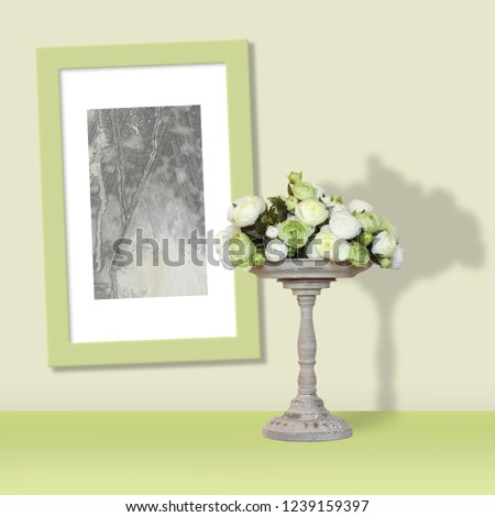 Still life - Pottery vases for flowers and Painting picture in a frame on a wall on a light background