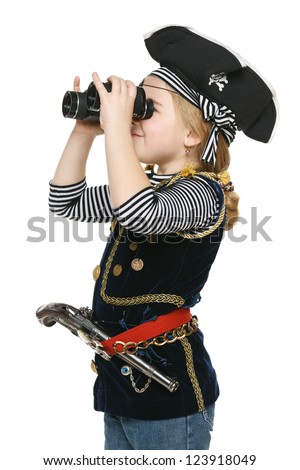 Six years girl wearing costume of pirate looking away through the binoculars, over white background