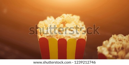 Popcorn. Minimalist. Concept of movie time.