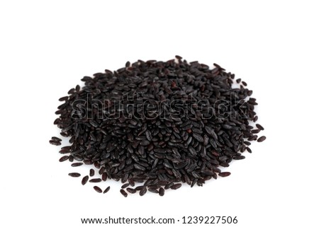 bunch of black rice on a white background