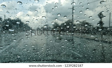 Rainy day view through the car window. Selective focus. 