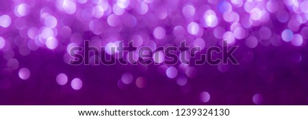 Purple glitter lights texture bokeh background Christmas