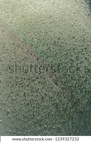 Drops of morning dew on camping tent, closeup photo