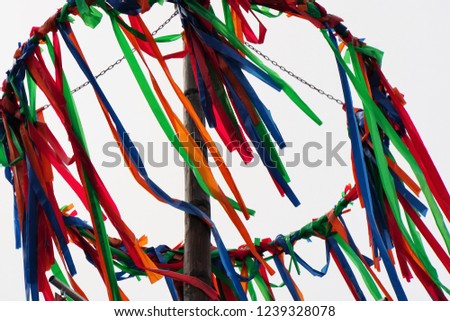 Maypole set-up, customs with a long tradition, Germany. Colorful Ribbons. Beautiful Background.