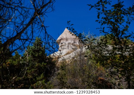 Zemi valley, Goreme, Cappadocia, Anatolia, Turkey: Beautiful landscape and view of white rock against blue sky in summer