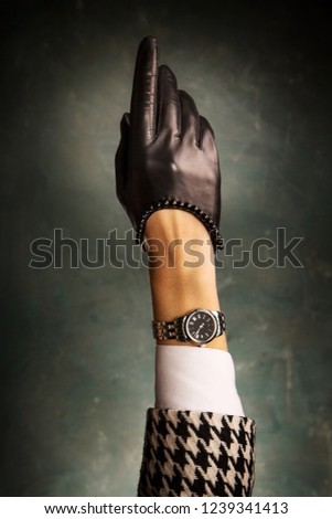 Female hand in a beautiful leather glove