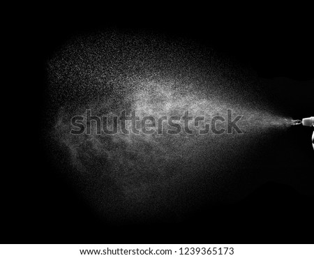 close up of spary water on black background Royalty-Free Stock Photo #1239365173