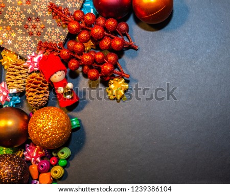 Christmas background with red baubles and decor. Top view with copy space