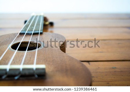 Ukulele guitar on the table
