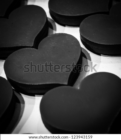 Wooden hearts. Vintage Valentine background. Black and white.