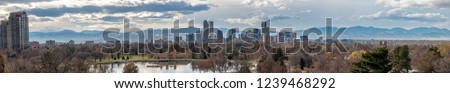 Large Panorama of the Denver Skyline With Large Clouds inthe Sky