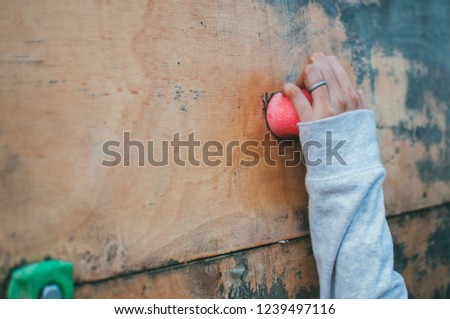 Close up Young girl hand climbing on indoor wall
