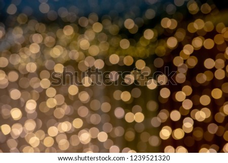 The blur of the bulb for decorative yellow gold, as the background.