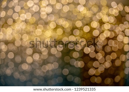 The blur of the bulb for decorative yellow gold, as the background.