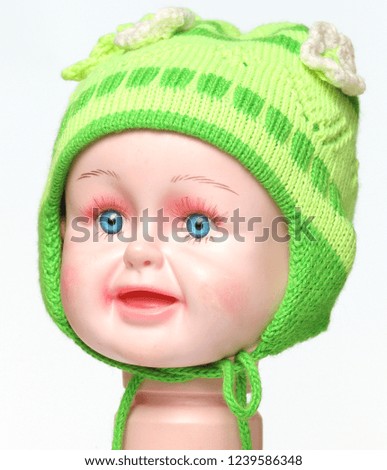 colored knitted children's winter hat made of wool