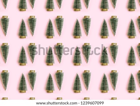 Christmas seamless pattern. Christmas background with christmas tree pink isolated over background. season