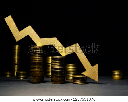 Market crisis concept. Falling arrow and money. Down of prices in a stock market. Royalty-Free Stock Photo #1239631378