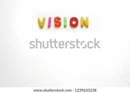 VISION - Word abstract in colourful letter blocks on a white background , Graphics Concept. 