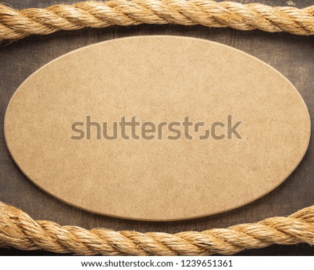 ship rope at wooden background surface