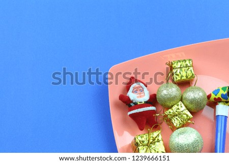 Christmas decorations on blue background and have copy space for design in your work concept.