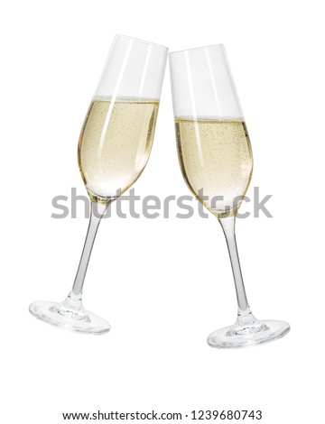 Two champagne glasses on a white background