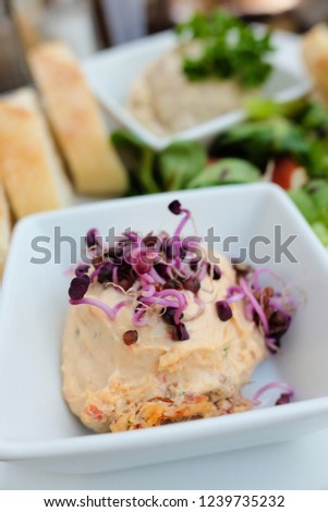 Delicious fish pate served on the white plates