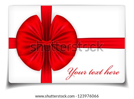 card with a red bow