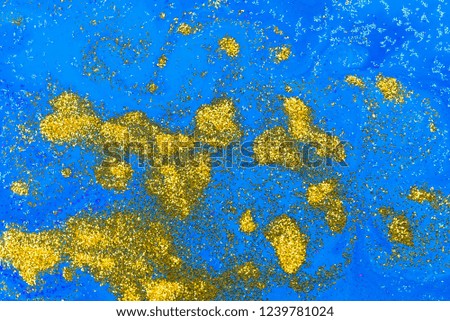 Colorful paint background in concept Fantasy texture. Colors dropped into liquid and photographed while in motion. Marbled blue abstract background. Liquid marble pattern.