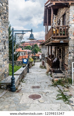 Traditional alley at Agios Athanasios village in Macedonia Greece near the snow center of Kaimaktsalan