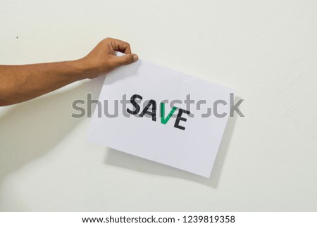 Hand holding paper with wording on white background. Save concept