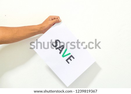 Hand holding paper with wording on white background. Save concept