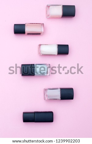 Cosmetics and accessories on a pink background. Flat lay