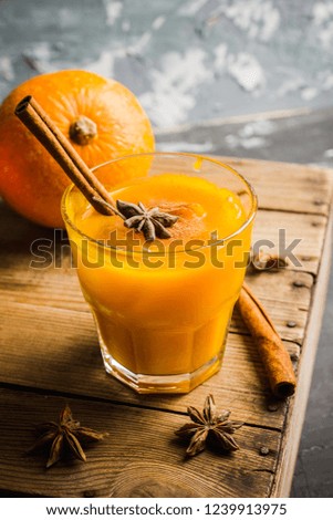 Refreshment and healthy autumn pumpkin drink. Selective focus. Shallow depth of field.