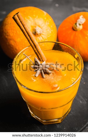 Refreshment and healthy autumn pumpkin drink. Selective focus. Shallow depth of field.