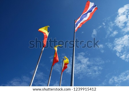 Thai flag is waving with the beautiful sky background