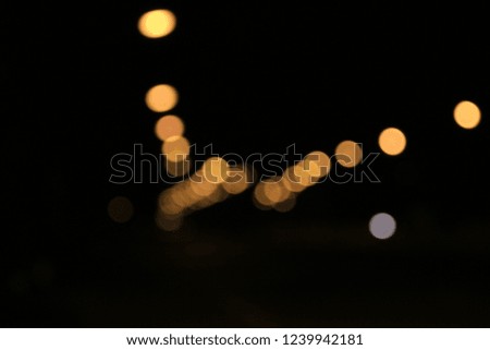 Bokeh made from a car driving on the road.
