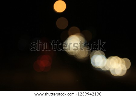 Bokeh made from a car driving on the road.